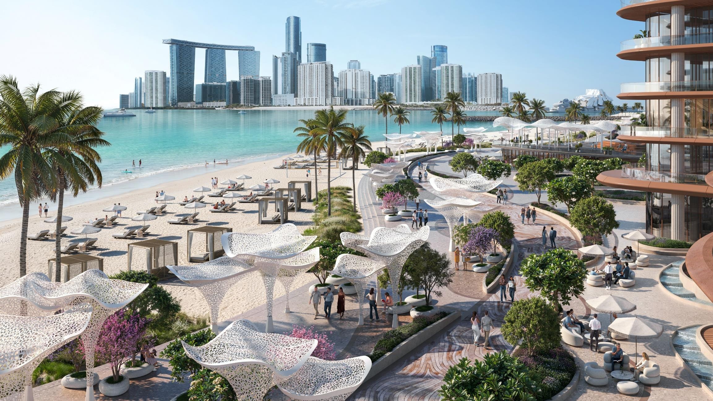 Strand und schattige Cabanas entlang der Wasserfront-Promenade von Marsa Al Saadiyat