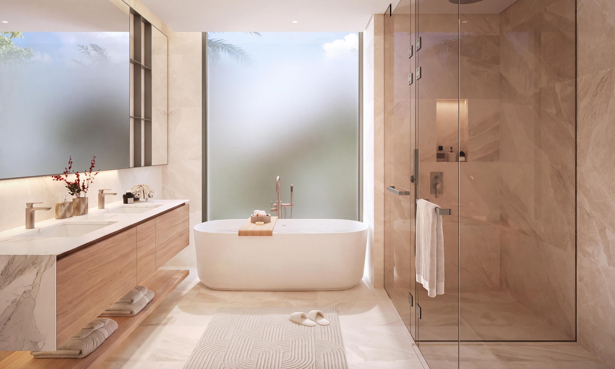 Master bathroom of a Talay villa with a freestanding bath, double vanity and glass shower