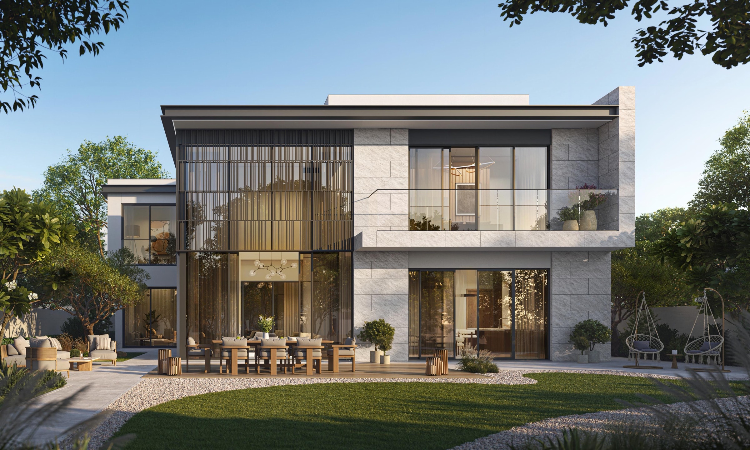 Private garden of a Talay villa with a terrace dining area and lawn