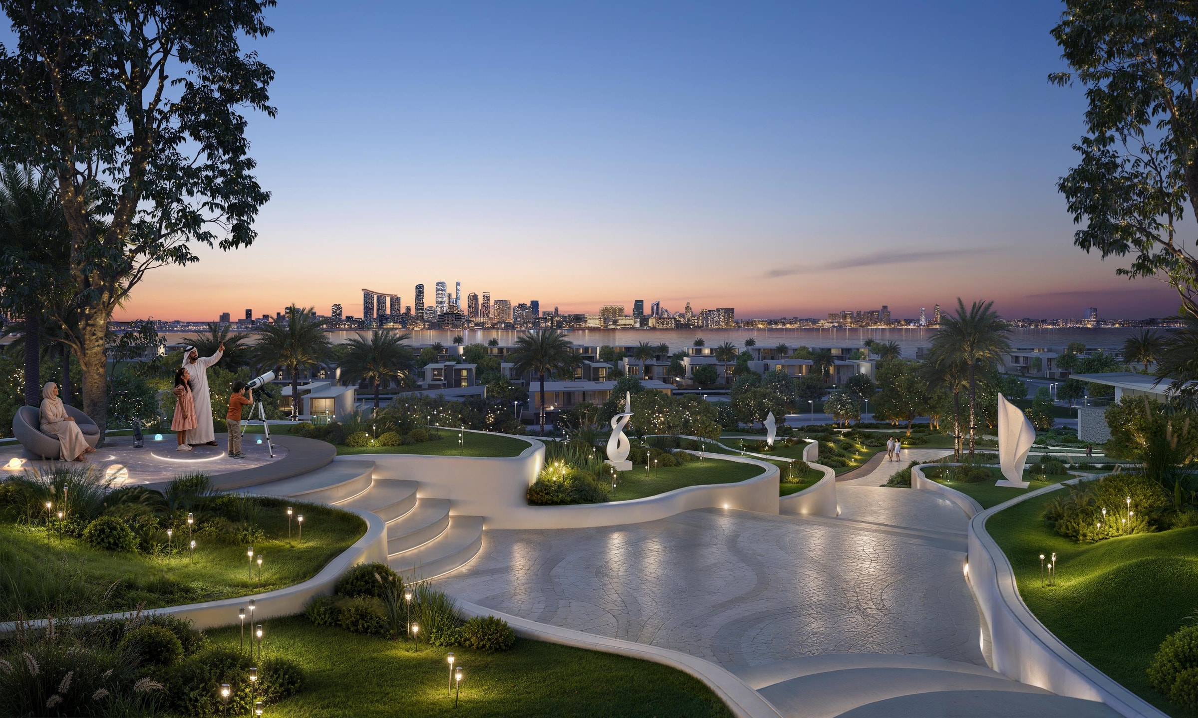 Landscaped lookout at Talay Beach at dusk, looking towards the Reem Island skyline